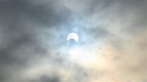 Brief cloud breaks bring cheers from excited partial solar eclipse watchers in B.C.